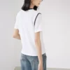 O1CN012FJKT41O62R1NPXLc_1870451655.jpg_q50.jpg_.webp 对白微皱肌理感撞色正肩短袖t恤女2026夏季新款圆领宽松显瘦上衣