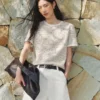 O1CN0159GFN51hFBDQrvCLM_112394247.jpg_q50.jpg_.webp 太平鸟爆款升级小香风短袖T恤26夏新洋气宽松圆领撞色针织衫上衣