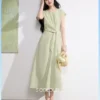 O1CN01EQZxPD1tJYOzPz2nH_745475881-0-picasso.jpg_q50.jpg_.webp 三彩2026夏季新款浅绿色短袖连衣裙圆领绑带收腰A字长裙简约女S