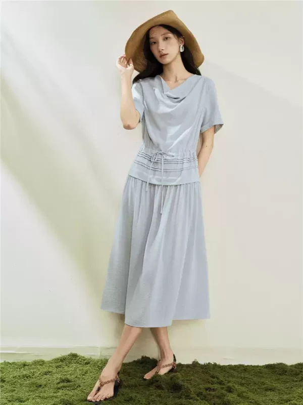 O1CN01JBwfkc2BTJvSv0tZh_94008339.jpg_q50.jpg_.webp 设计师款佐丹奴短袖裙子女假两件荡领压褶绑带收腰连衣裙18466509