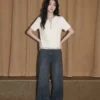 O1CN01PV70cC1QIWeFvUz4C_2208886651953.jpg_q50.jpg_.webp 假两件V领短袖T恤女夏季2026新款半拉链条纹拼接法式小资漂亮上衣