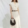 O1CN01R3GRnP22Xb0cZp09K-2209697117130.jpg_q50.jpg_.webp ELLE老钱风亚麻连衣裙女2026夏新款收腰松弛感通勤时尚a字裙长裙