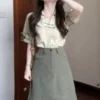 O1CN01SyYGr21nGuLrpoiC4_2261115063.jpg_q50.jpg_.webp 夏季女装2026新款大方得体穿搭一整套巨好看新中式国风套装半身裙