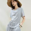 O1CN01pafkeR2BTJvSbhg73_94008339.jpg_q50.jpg_.webp 设计师款佐丹奴短袖裙子女假两件荡领压褶绑带收腰连衣裙18466509