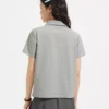 O1CN01pi7Fb21RqFQCHy2X0_106852162.jpg_q50.jpg_.webp 热风女士V领POLO衫短袖T恤上衣2026年夏季新款灰色基础POLO短T恤