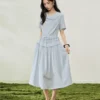 O1CN01pltYA02BTJvqvvXWV_94008339-0-picasso.jpg_q50.jpg_.webp 设计师款佐丹奴短袖裙子女假两件荡领压褶绑带收腰连衣裙18466509