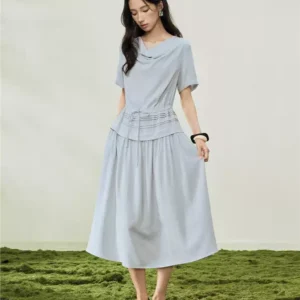 O1CN01pltYA02BTJvqvvXWV_94008339-0-picasso.jpg_q50.jpg_.webp 设计师款佐丹奴短袖裙子女假两件荡领压褶绑带收腰连衣裙18466509