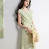 O1CN01rp3hRj1tJYOUWMWyN_745475881.jpg_q50.jpg_.webp 三彩2026夏季新款浅绿色短袖连衣裙圆领绑带收腰A字长裙简约女S