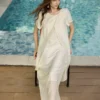 O1CN01uy276I22Xb5UgBxT2-2209697117130.jpg_q50.jpg_.webp ELLE莱赛尔酸奶油天丝连衣裙女2026夏新款荷叶边不规则a字长裙子