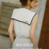 O1CN01vObJAI22Xb59JRoYJ-2209697117130.jpg_q50.jpg_.webp 【航海千金】ELLE海军领披肩无袖小衫女2026夏新款设计感针织衫