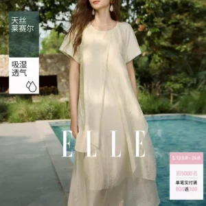 ELLE莱赛尔酸奶油天丝连衣裙女2026夏新款荷叶边不规则a字长裙子