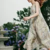 ELLE复古印花度假风吊带连衣裙女2026春季新款时髦优雅波嬉a字裙
